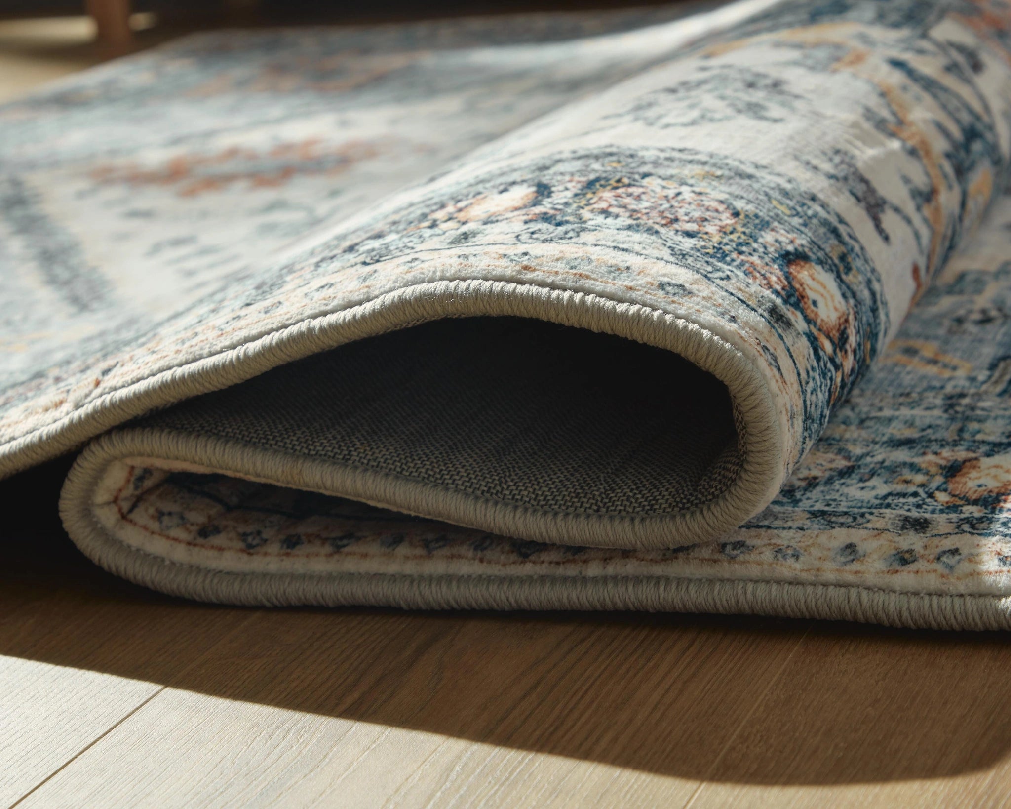 Wallney Area Rug